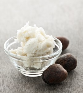 Shea nuts and sheabutter in glass bowl